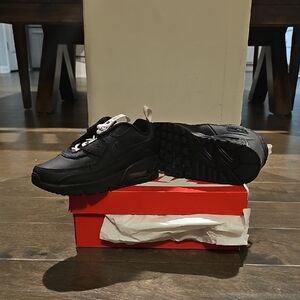 Nike Black Sneakers with Textured Upper and White Accents